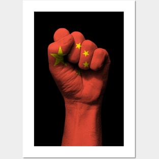 Flag of China on a Raised Clenched Fist Posters and Art